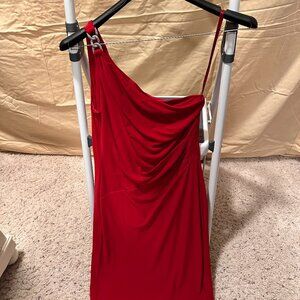 Red one shoulder midi dress with silver sparkle chain details holding the strap